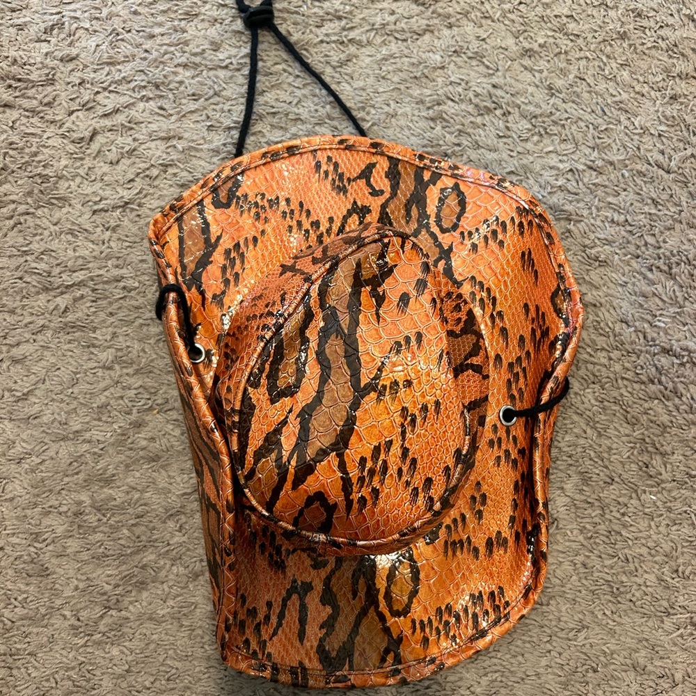 Orange snakeskin looking cowboy hat